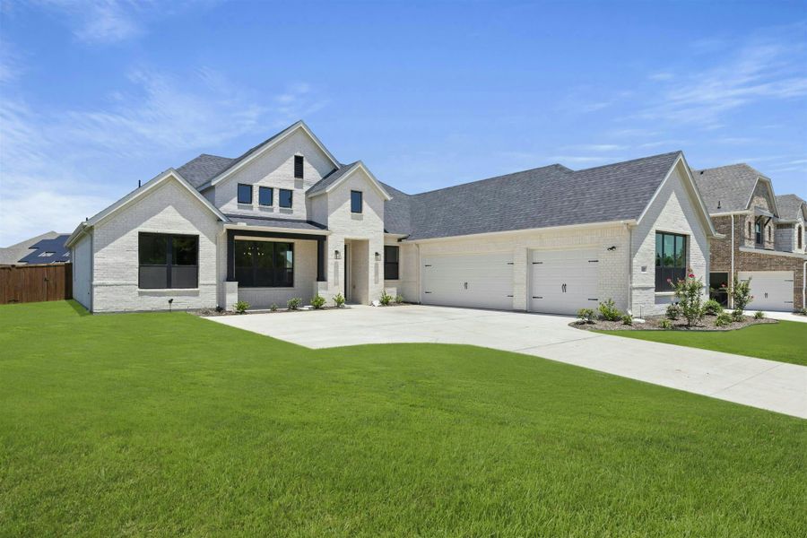 Front exterior of a new home in Kentsdale Farms, DeSoto, TX, highlighting curb appeal (Image 24). Front exterior of a new home in Kentsdale Farms, DeSoto, TX, highlighting curb appeal (Image 24).