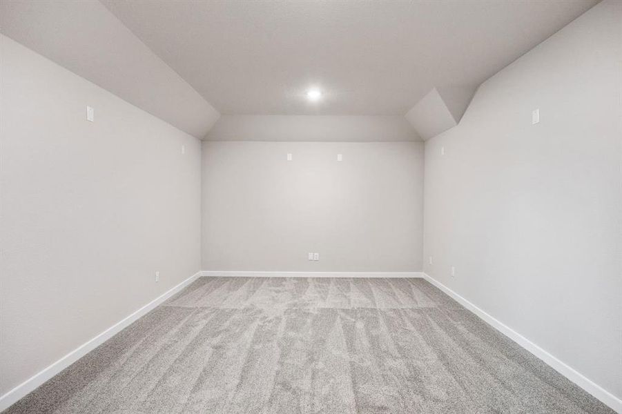 Media Room in the Wimbledon home plan by Trophy Signature Homes – REPRESENTATIVE PHOTO