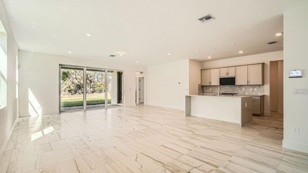 Representative furnished interior of a home built from the Ponte Vedra by D.R. Horton in Preserves at Park Trace, Stuart (Image 4).