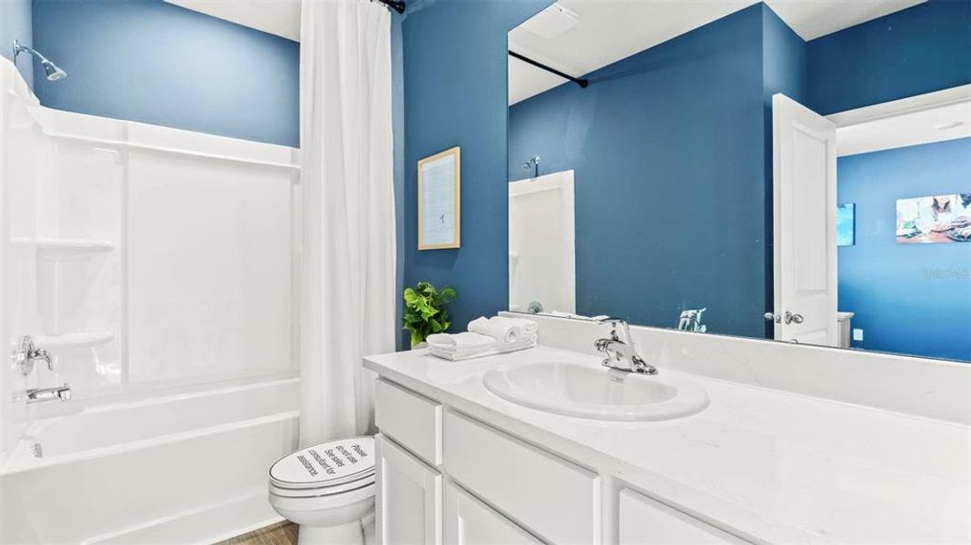 Furnished interior view inside a new home in Oasis at Longwood Run, Sarasota (Image 18).