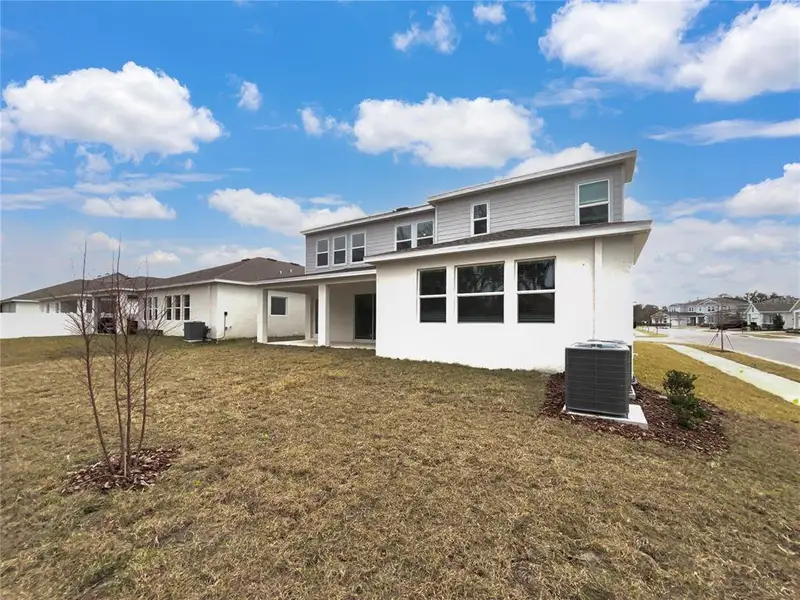 Exterior details and patio area of a home in Rivington, Debary (Image 3).