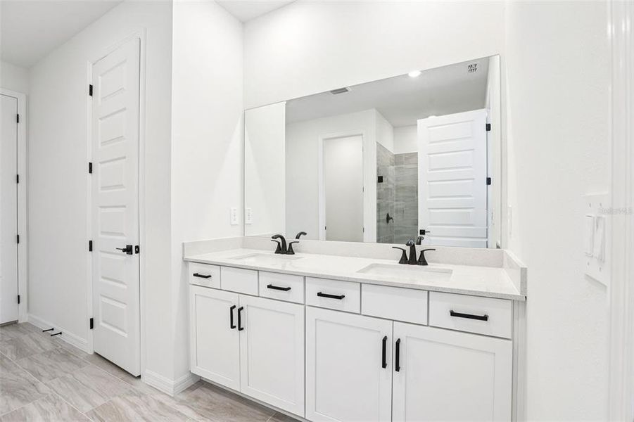 Furnished interior view inside a new home in Two Rivers - Signature Series, Zephyrhills (Image 8). Furnished interior view inside a new home in Two Rivers - Signature Series, Zephyrhills (Image 8).