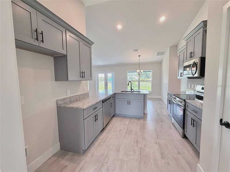 Furnished interior view inside a new home in Rotonda, Port Charlotte (Image 5).