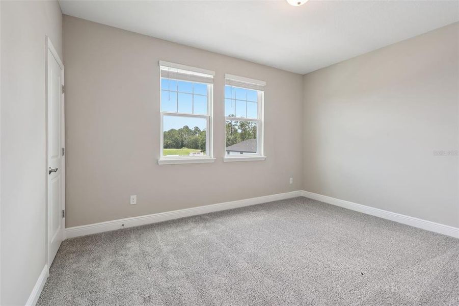 Spacious, unfurnished interior of a new home in Legends Preserve - Signature Series, Daytona Beach (Image 38).