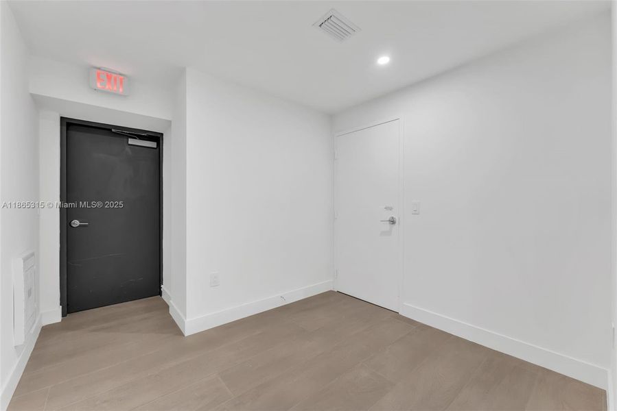 Spacious, unfurnished interior of a new home in Aria Reserve, Miami (Image 22). Spacious, unfurnished interior of a new home in Aria Reserve, Miami (Image 22).