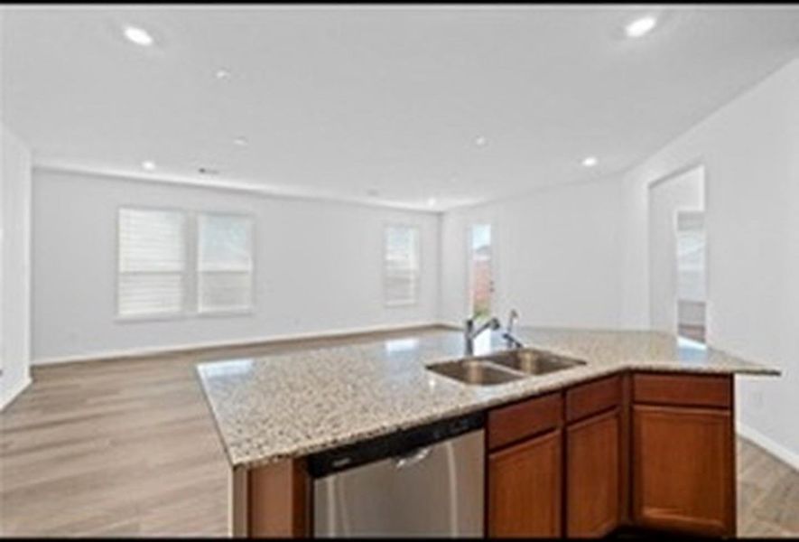 Furnished interior view inside a new home in Sunterra, Katy (Image 9).