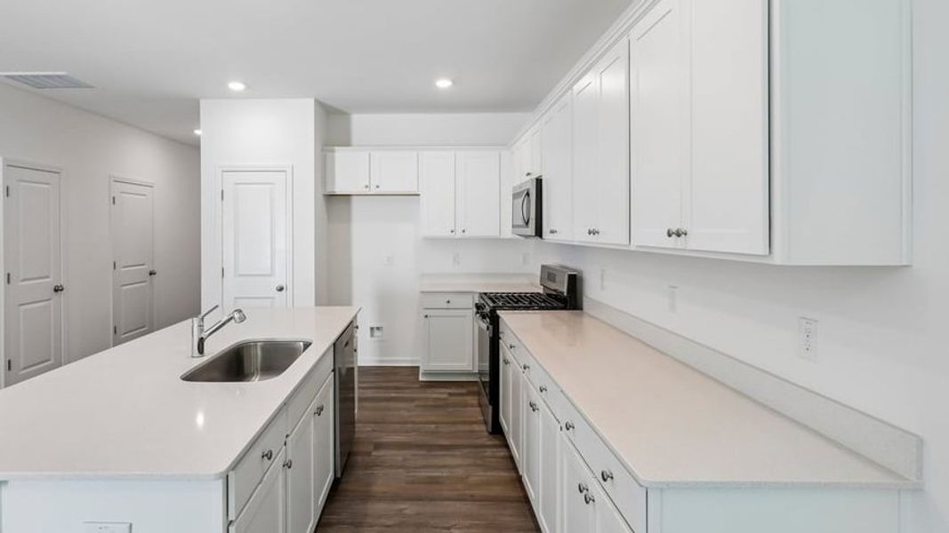 Furnished interior view inside a new home in The Townes at Belle Grove, Wendell (Image 3).