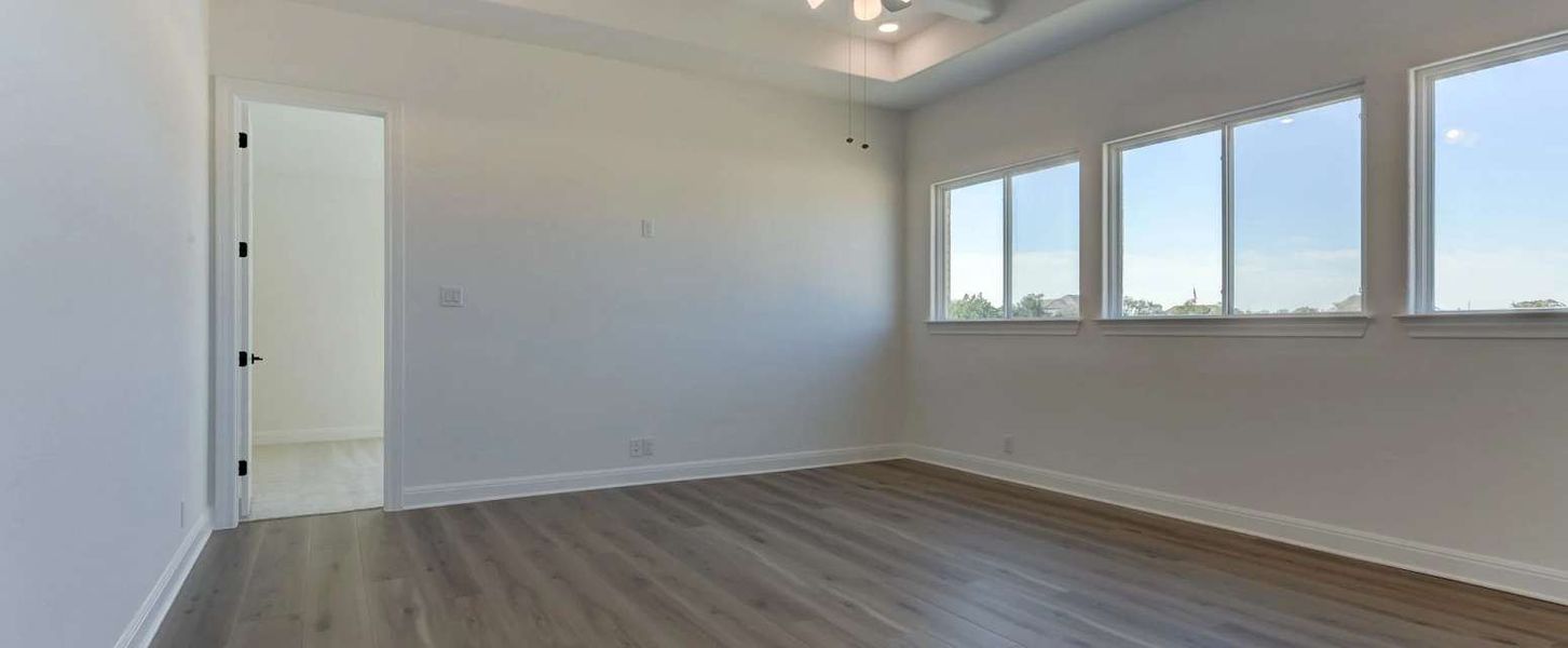 Representative unfurnished interior of a home built from the Kylie by Ashton Woods in Waldsanger, New Braunfels (Image 18).