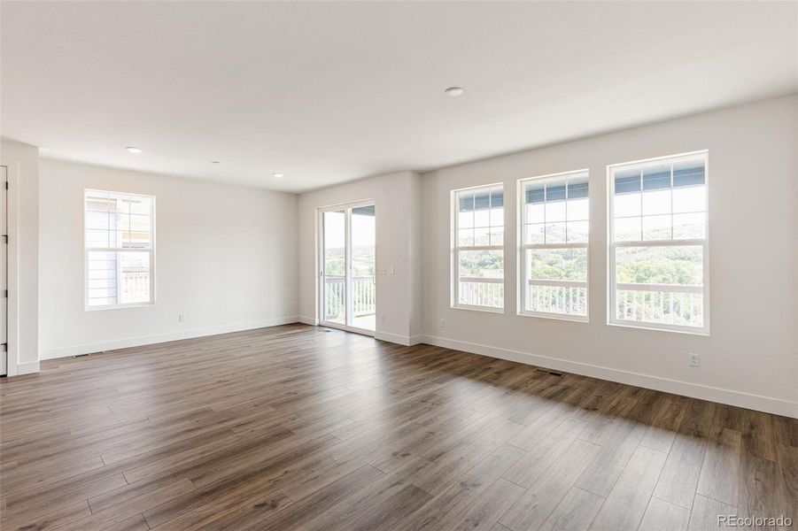 Spacious, unfurnished interior of a new home in Terrain Oak Valley, Castle Rock (Image 27).