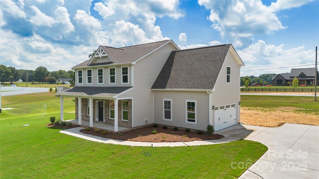 Front exterior of a new home in , Stanfield, NC, highlighting curb appeal (Image 19).
