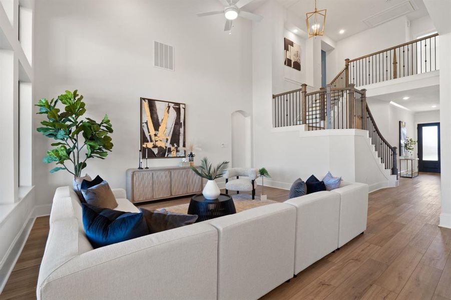 High ceilings in living room with ceiling fan