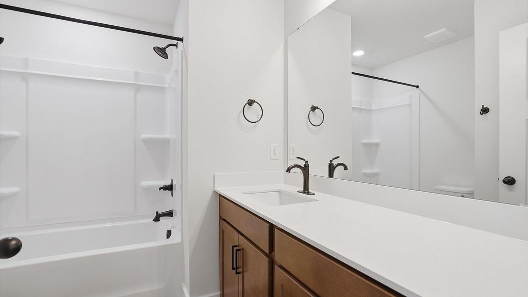 Highly skilled design seen in this polished and practical full bathroom at the new Marion Square community Highly skilled design seen in this polished and practical full bathroom at the new Marion Square community