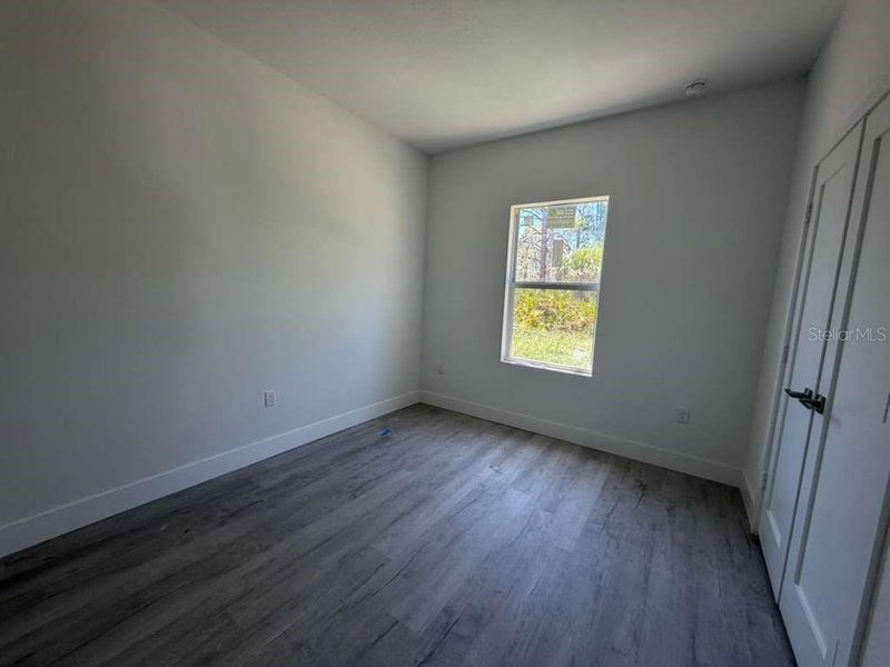 Spacious, unfurnished interior of a new home in , Port Charlotte (Image 14).