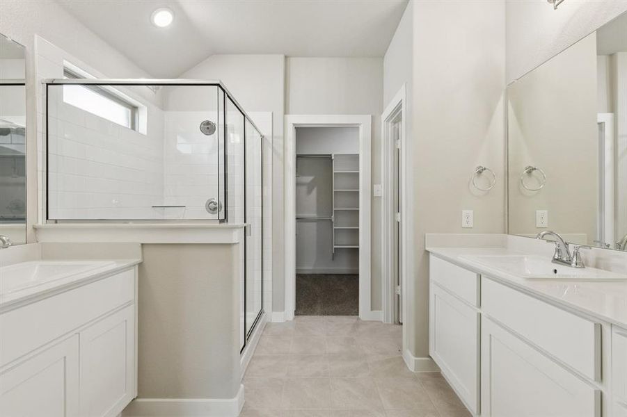 Primary Bathroom in the Heisman home plan by Trophy Signature Homes – REPRESENTATIVE PHOTO