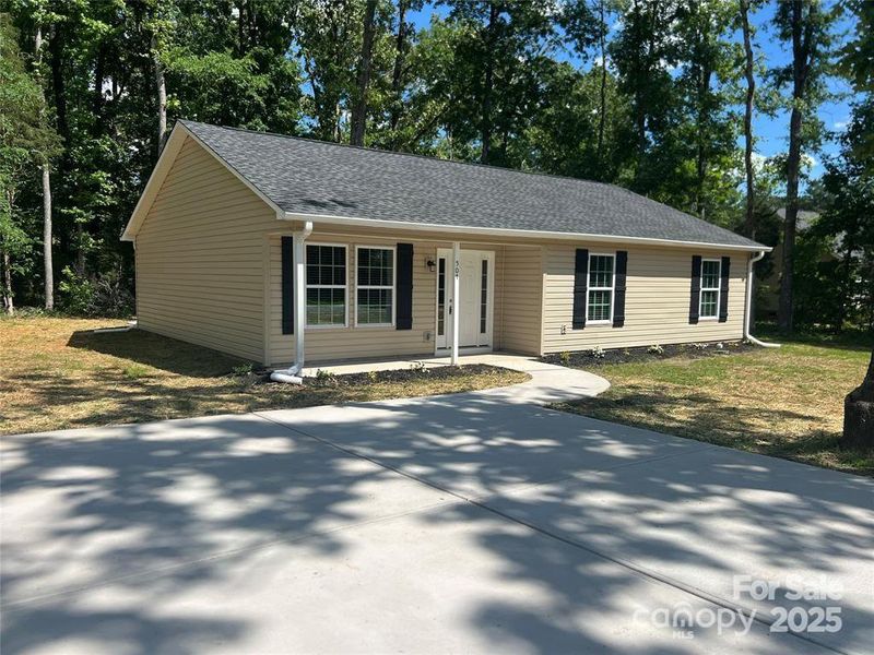 Front exterior of a new home in , Chester, SC, highlighting curb appeal (Image 13).
