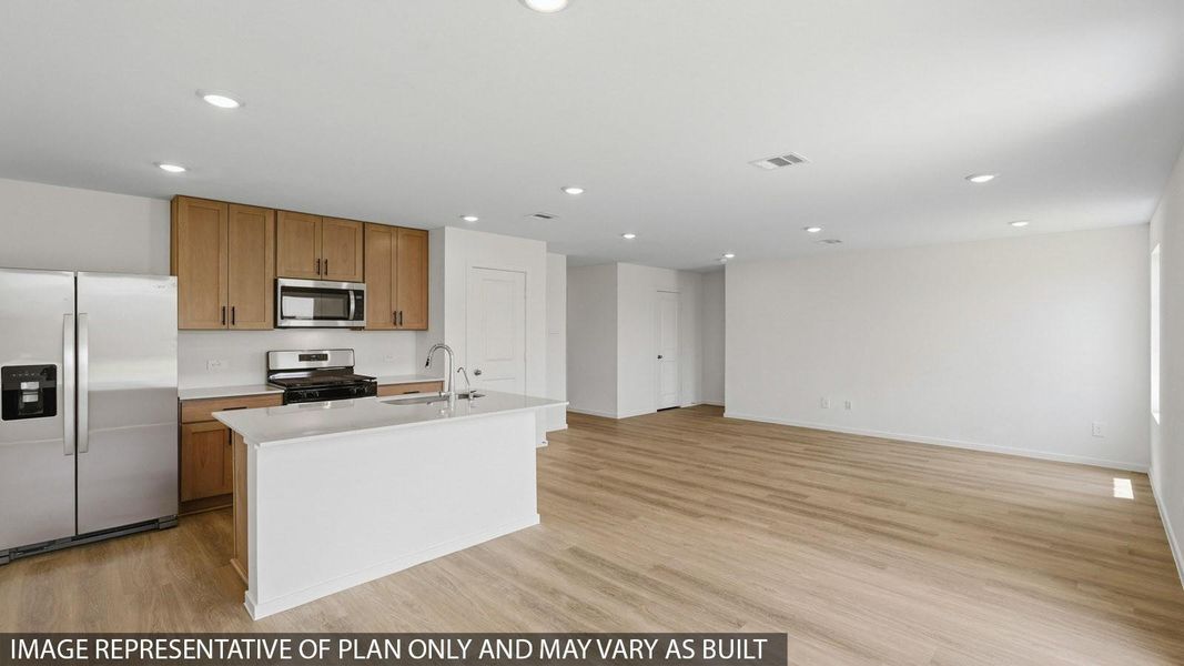 Furnished interior view inside a new home in Sunterra, Katy (Image 4).