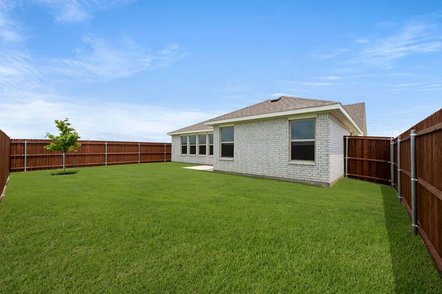 Representative exterior photo of a completed home built from the Austin by Impression Homes in Northspur, Terrell, TX (Image 5). Representative exterior photo of a completed home built from the Austin by Impression Homes in Northspur, Terrell, TX (Image 5).