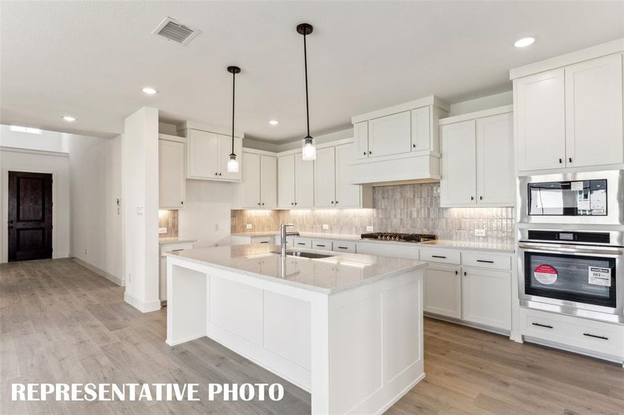 No shortage of storage or prep space in this fantastic kitchen!  REPRESENTATIVE PHOTO