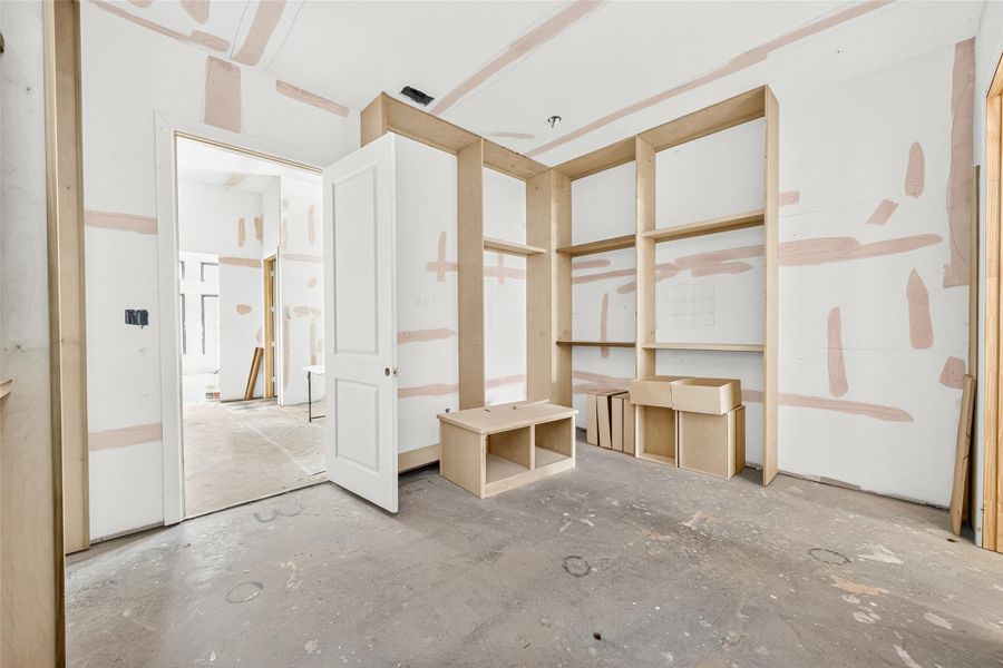 Primary closet will feature an island with drawers