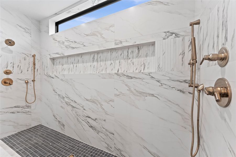 Luxury walk-in shower with statement tile.