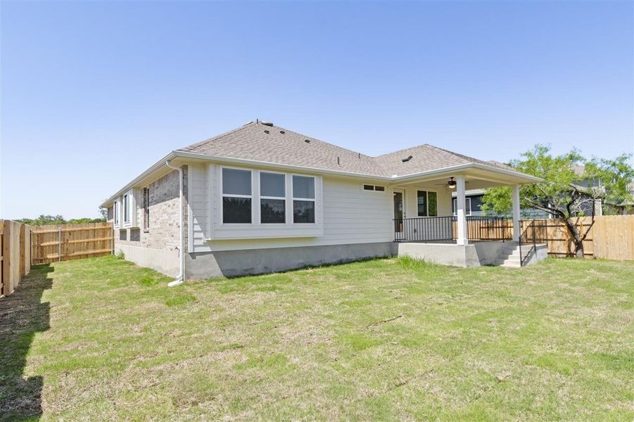 Front exterior of a new home in Grande Estates, Bertram, TX, highlighting curb appeal (Image 21).