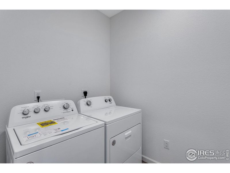 Furnished interior view inside a new home in Westside Crossing Townhomes, Berthoud (Image 6).