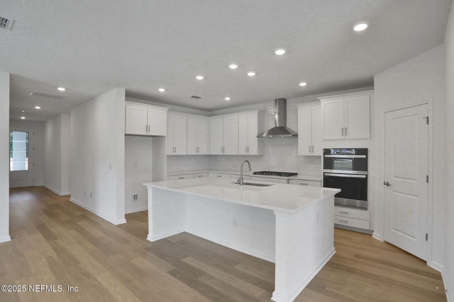 Furnished interior view inside a new home in Brook Forest - Single Family Homes, St. Augustine (Image 11). Furnished interior view inside a new home in Brook Forest - Single Family Homes, St. Augustine (Image 11).