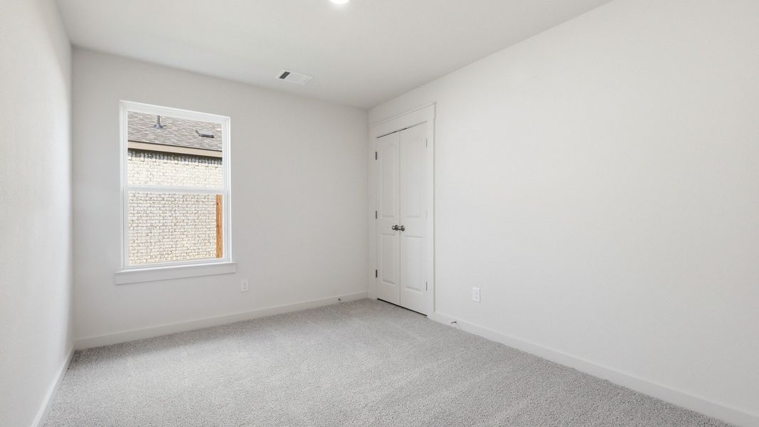 Furnished interior view inside a new home in Patriot Estates, Venus (Image 18).
