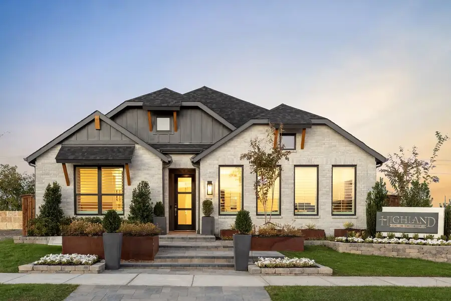 Front exterior of a new home in Waterscape, Royse City, TX, highlighting curb appeal (Image 1). Front exterior of a new home in Waterscape, Royse City, TX, highlighting curb appeal (Image 1).