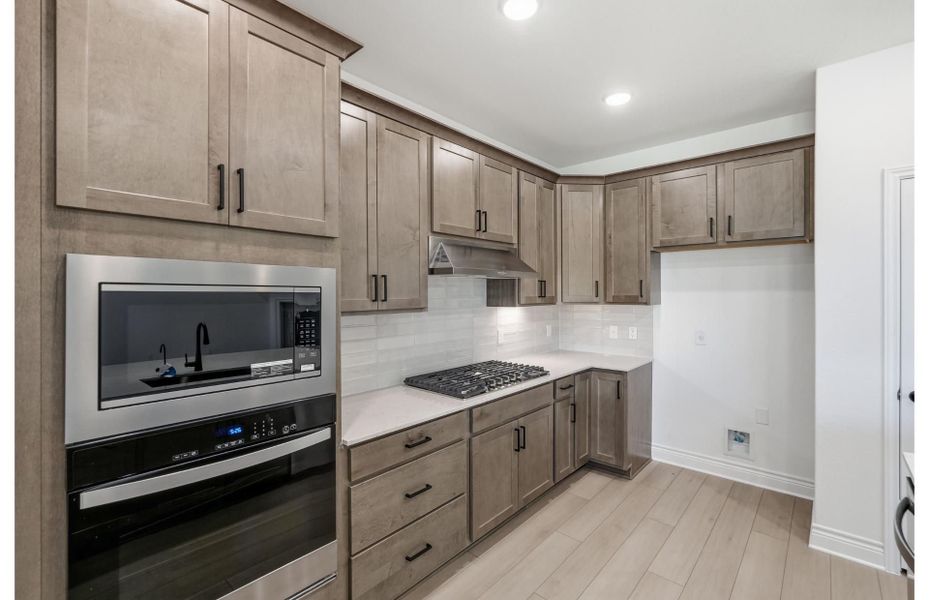 Representative furnished interior of a home built from the Dayton by Pulte Homes in Davis Ranch, San Antonio (Image 4).
