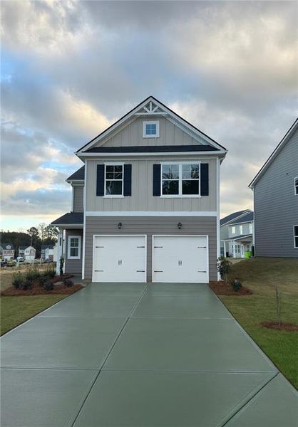 Front exterior of a new home in Fairview Lake, Conyers, GA, highlighting curb appeal (Image 1). Front exterior of a new home in Fairview Lake, Conyers, GA, highlighting curb appeal (Image 1).