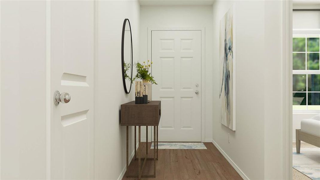 Doorway with hardwood / wood-style floors