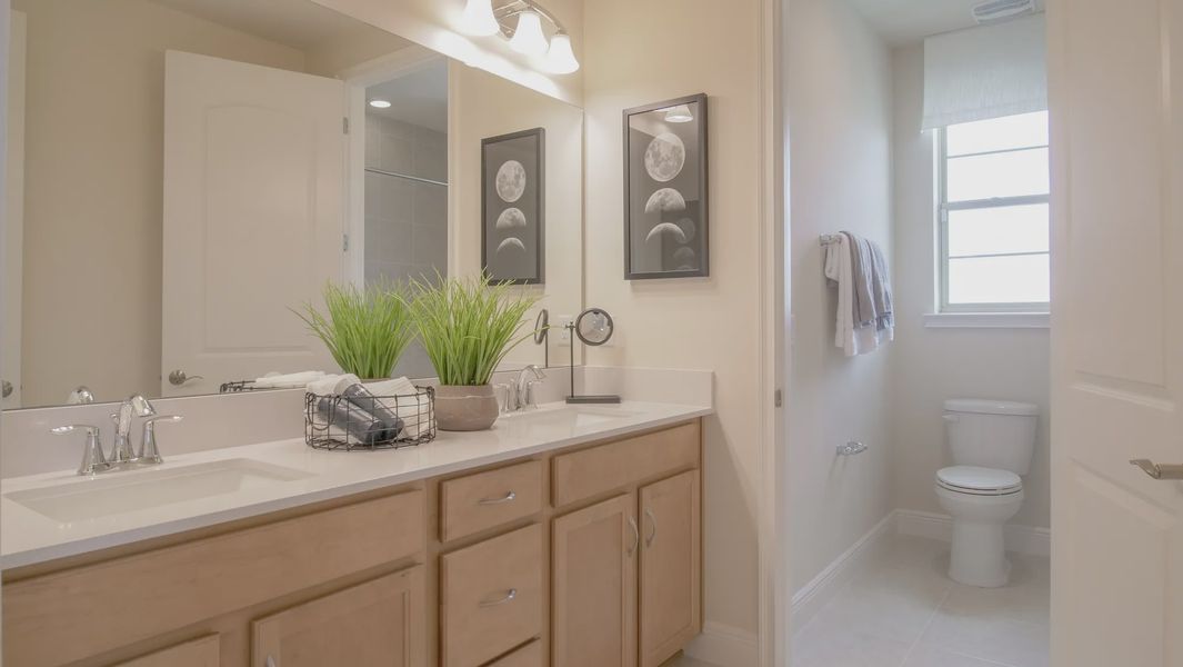 Representative furnished interior of a home built from the Woodmere II by Jones Homes USA in Reserve at Twin Lakes, St. Cloud (Image 13). Representative furnished interior of a home built from the Woodmere II by Jones Homes USA in Reserve at Twin Lakes, St. Cloud (Image 13).