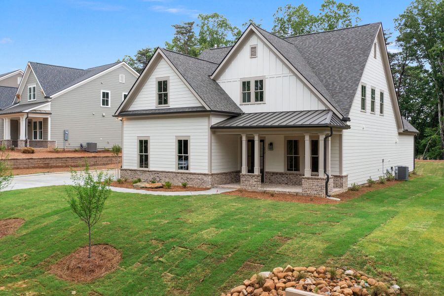 Front exterior of a new home in Lake Arrowhead, Waleska, GA, highlighting curb appeal (Image 21).