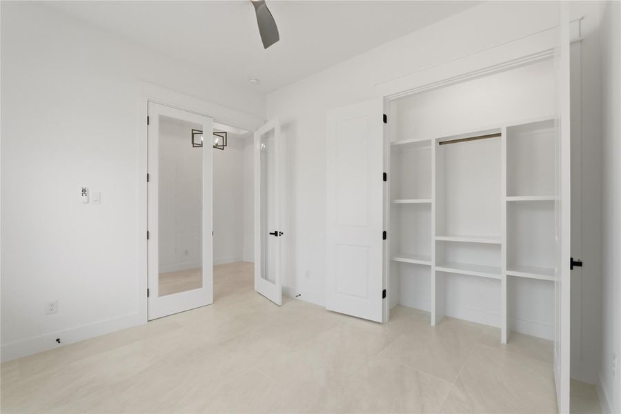 Find the first bedroom off the entrance - can be used as an office space, guest room, gaming area or even