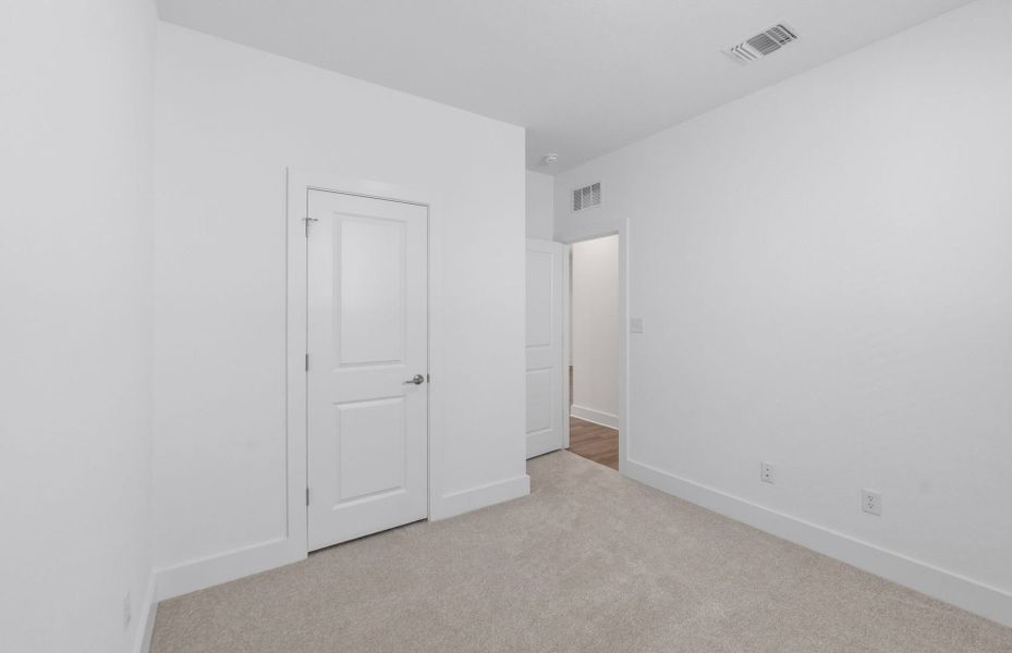 Spacious, unfurnished interior of a new home in Saddleback at Santa Rita Ranch, Liberty Hill (Image 38).