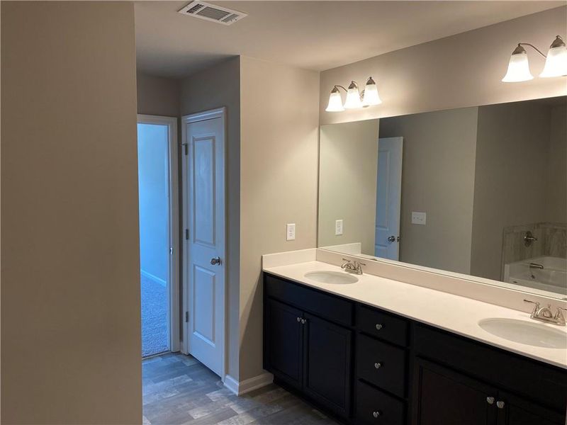 Furnished interior view inside a new home in , Oakwood (Image 2).