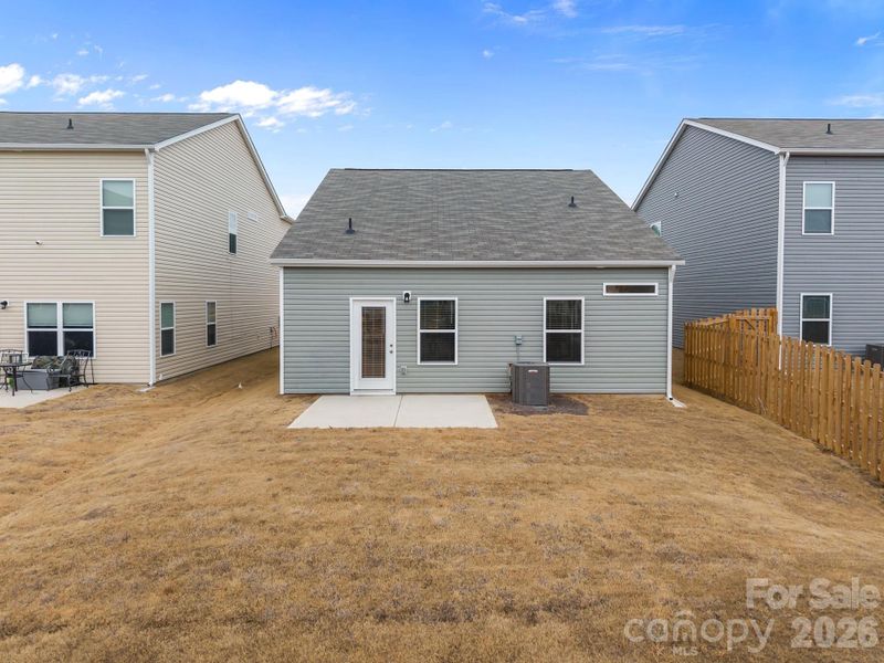 Exterior details and patio area of a home in Country Club Village, Salisbury (Image 4).