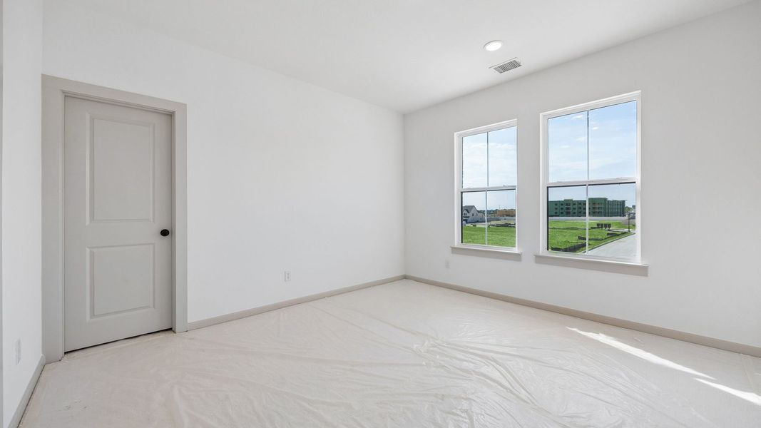 Representative unfurnished interior of a home built from the Orleans II by Normandy Homes in Rainwater Crossing, Celina (Image 13).