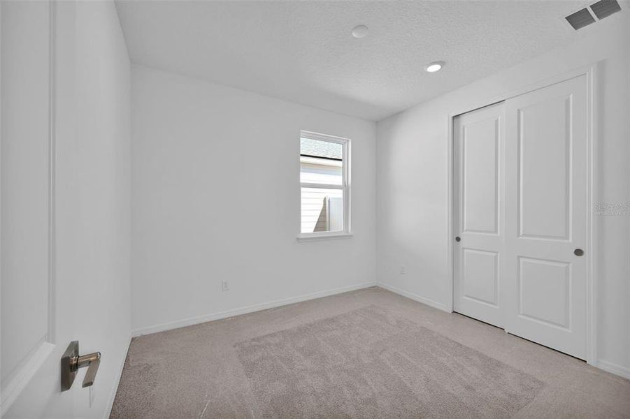 Spacious, unfurnished interior of a new home in Lakeview Estates, Palm Coast (Image 27). Spacious, unfurnished interior of a new home in Lakeview Estates, Palm Coast (Image 27).