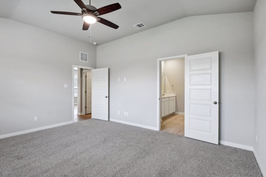 Primary suite in the Medina floorplan at a Meritage Homes community.