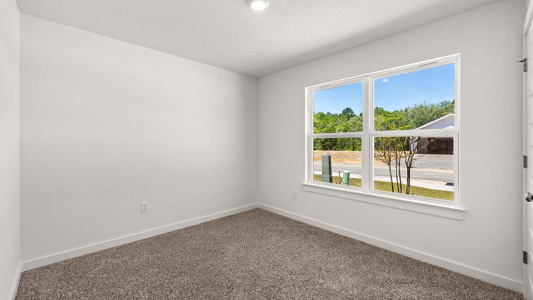 Spacious, unfurnished interior of a new home in Magnolia at the Bluffs Phase 3, Freeport (Image 19).