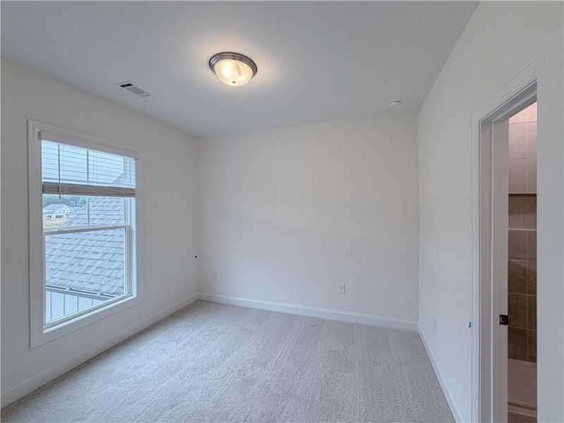 Spacious, unfurnished interior of a new home in Ashbury Commons, Powder Springs (Image 22).