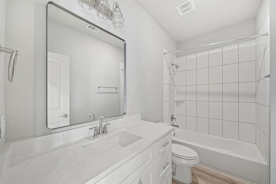 Full bathroom- you will find quartz counter tops in all areas!