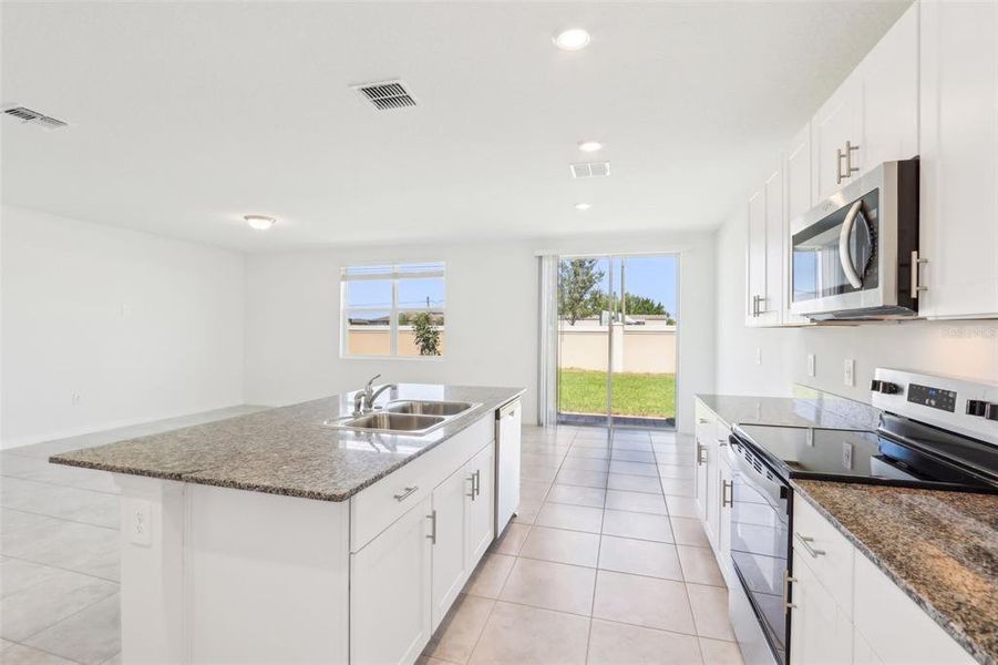 Furnished interior view inside a new home in Lawson Dunes - Signature Series, Haines City (Image 3). Furnished interior view inside a new home in Lawson Dunes - Signature Series, Haines City (Image 3).
