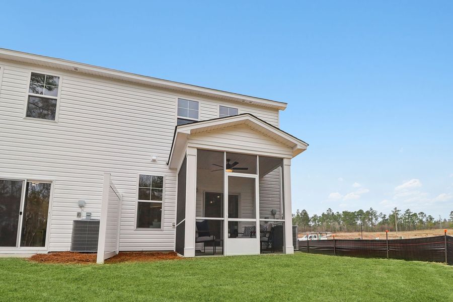 Exterior details and patio area of a home in Victorywoods Village Townhomes, Columbia (Image 24). Exterior details and patio area of a home in Victorywoods Village Townhomes, Columbia (Image 24).
