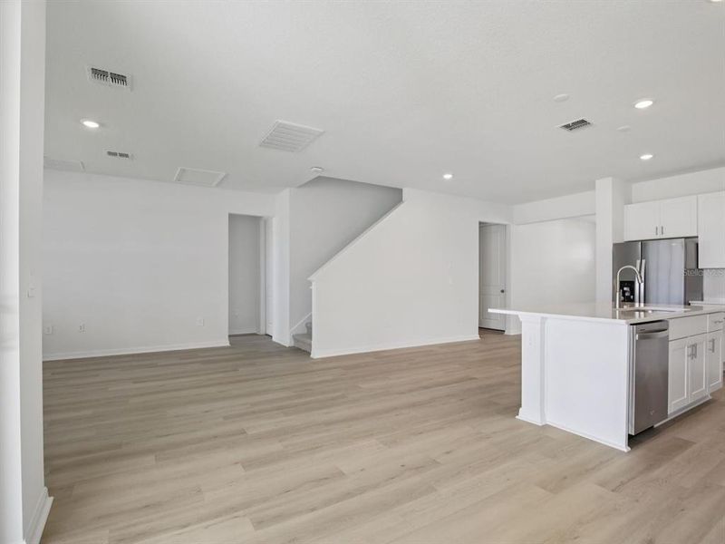 Spacious, unfurnished interior of a new home in Coasterra - Reserve Series, Palmetto (Image 35).