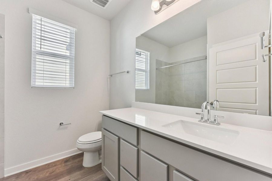 Furnished interior view inside a new home in Stallion Run, Buda (Image 4).