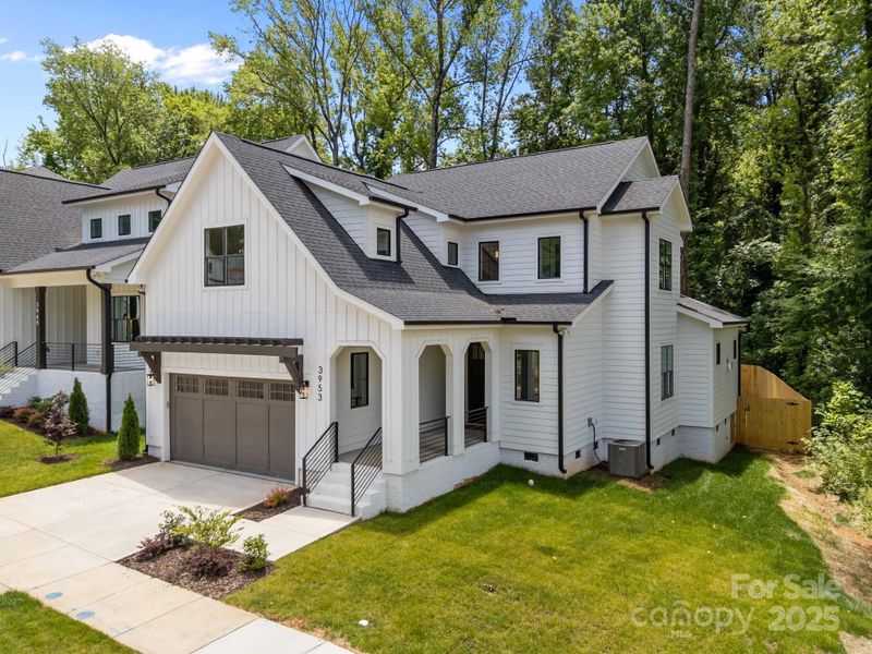 Front exterior of a new home in , Charlotte, NC, highlighting curb appeal (Image 22).