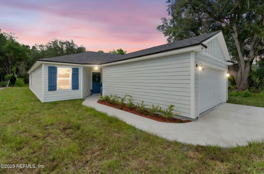 Front exterior of a new home in , Green Cove Springs, FL, highlighting curb appeal (Image 25).